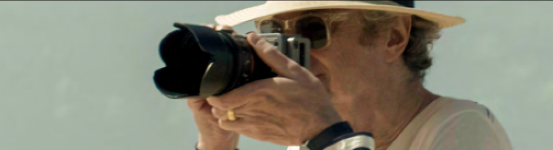 Hombre con cámara fotografica 