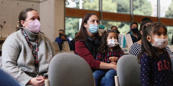 Familias durante evento del Programa Nidos