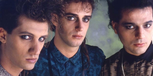 Integrantes de Soda Stereo maquillados. 